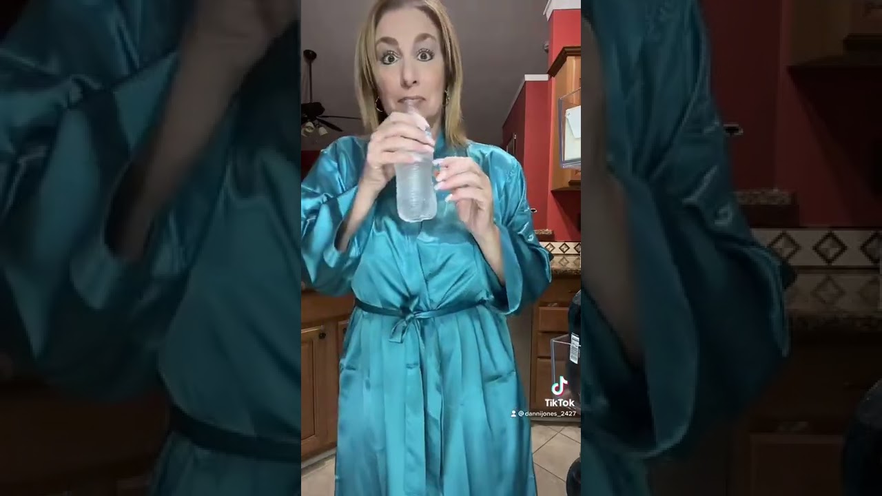 Needed a cold drink 🥵 therealdannijones.com #shorts #tiktok #robe #roleplay #olderwomen #foryou