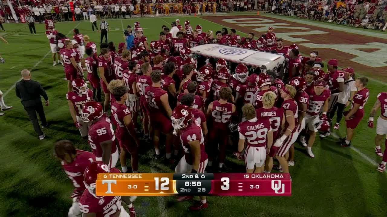Entire Oklahoma team gathers near Kendel Dolby as he's carted off the field | ESPN College Football
