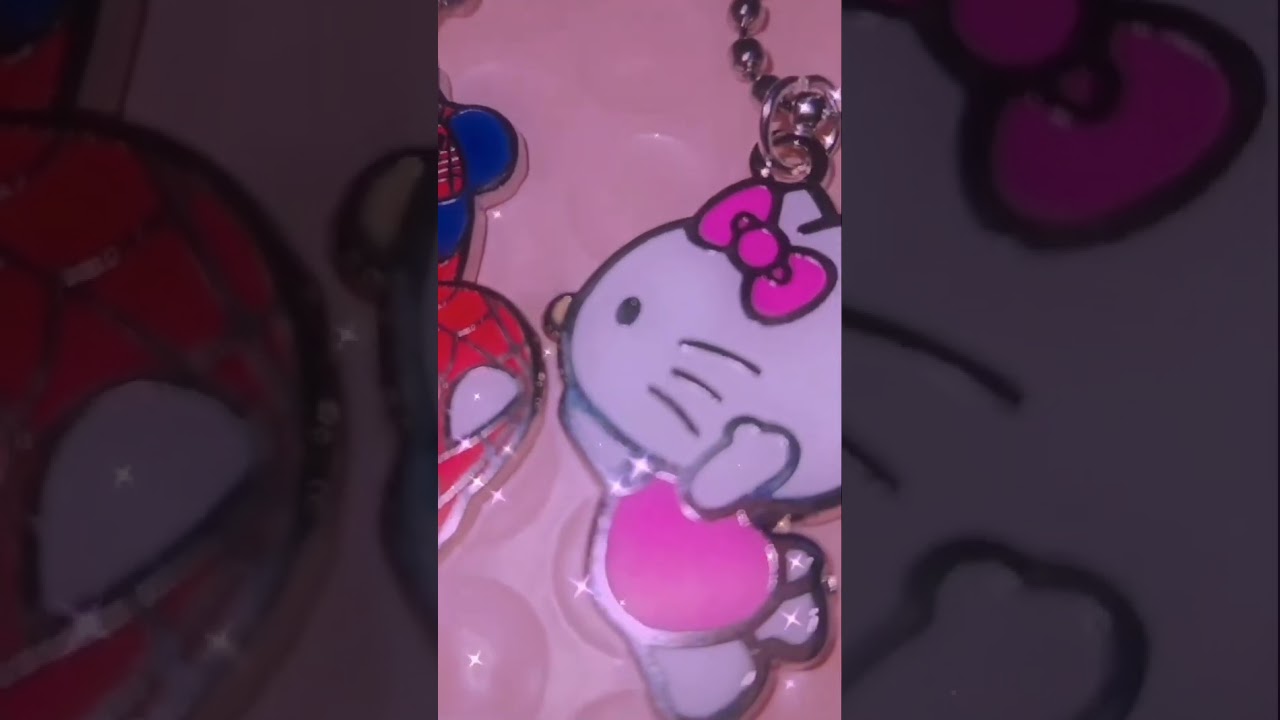 Spider-Man in hello kitty matching necklace 
