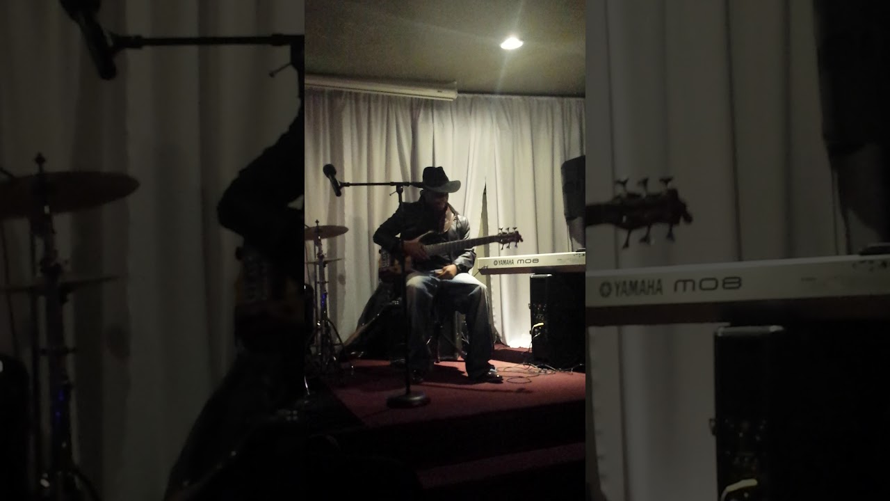 Tommy Gooding on bass guitar